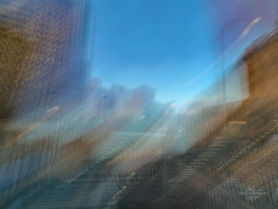 Towers raked into diagonal strands against blue, Lee Street, Sydney, 2026, from the Sydney Streets series, an Intentional Camera Movement photograph by Jacky Lee