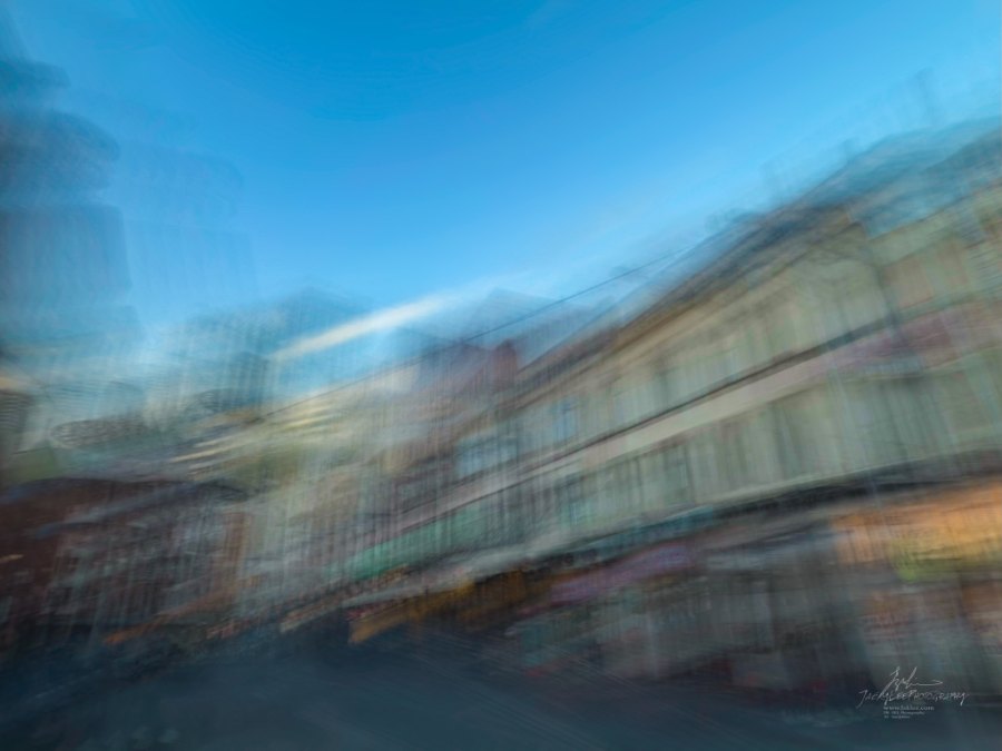 Terrace rooflines raked into a single diagonal sweep, Ultimo Road, Sydney, 2026, from the Sydney Streets series, an Intentional Camera Movement photograph by Jacky Lee